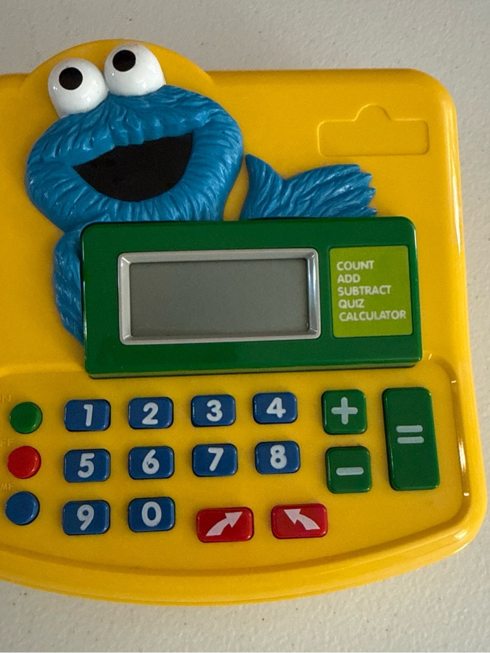 Fisher-Price Yellow Kids Calculator Toy with Blue Cookie Character